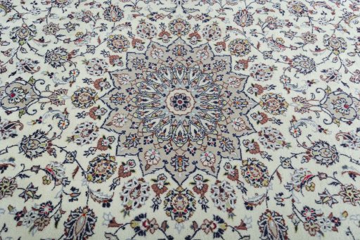 Central medallion detail of 2000s Kashan rug from Iran / Persia