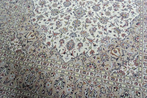 Close-up detail of 2000s Kashan rug from Iran / Persia showing Wool weave