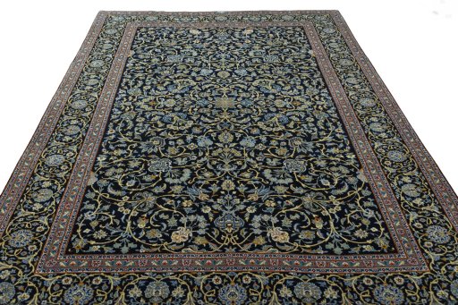 Surface texture of 2000s Kashan rug with natural Wool and intricate pattern