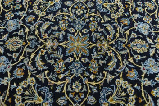 Central medallion detail of 2000s Kashan rug from Iran / Persia