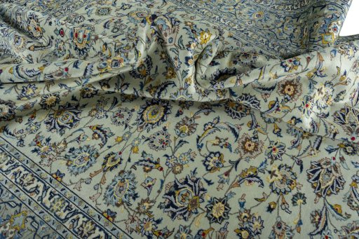 Surface texture of 1970s Kashan rug with natural Wool and intricate pattern