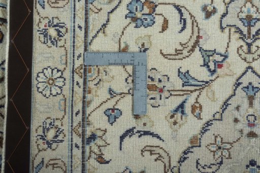 Surface texture of 2000s Kashan rug with natural Wool and intricate pattern