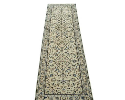 Surface texture of 2000s Kashan rug with natural Wool and intricate pattern