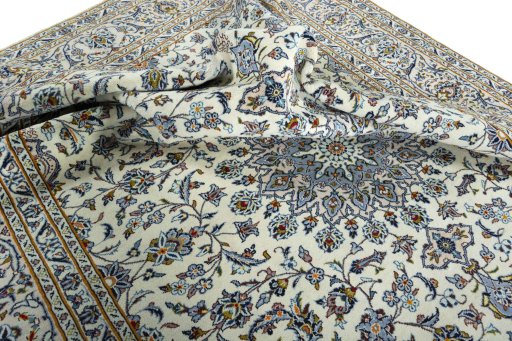 Surface texture of 2000s Kashan rug with natural Wool and intricate pattern