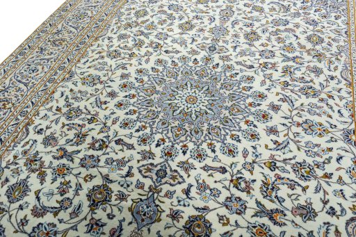 Backside of handmade 2000s Kashan rug showing knot structure and weave density