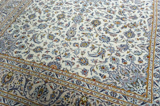 Close-up detail of 2000s Kashan rug from Iran / Persia showing Wool weave