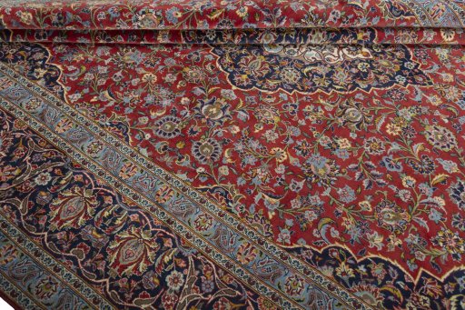 Close-up detail of 2000s Kashan rug from Iran / Persia showing Cork weave