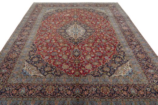 Surface texture of 2000s Kashan rug with natural Cork and intricate pattern