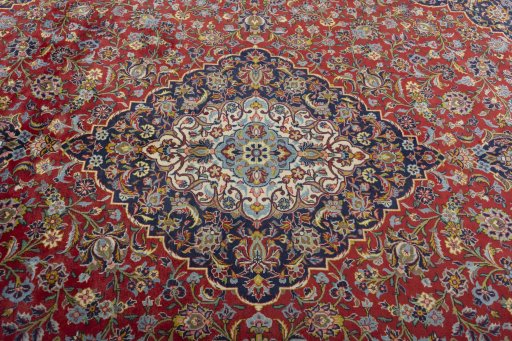 Central medallion detail of 2000s Kashan rug from Iran / Persia