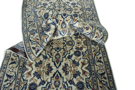 Close-up detail of 2000s Kashan rug from Iran / Persia showing Wool weave