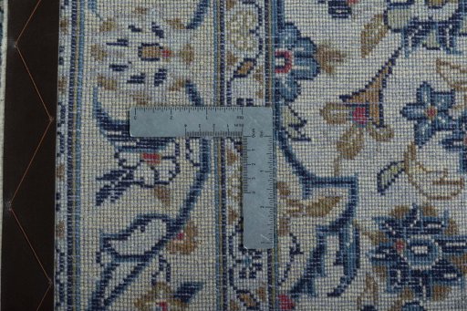 Surface texture of 2000s Kashan rug with natural Wool and intricate pattern