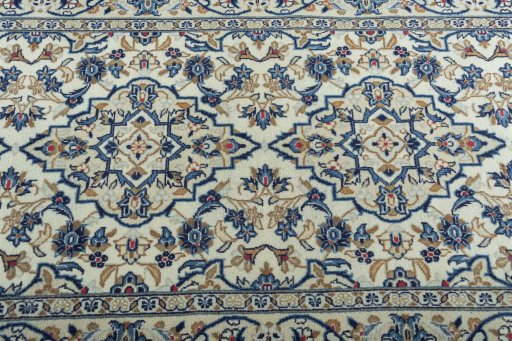 Central medallion detail of 2000s Kashan rug from Iran / Persia