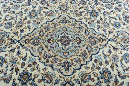 Central medallion detail of 2000s Kashan rug from Iran / Persia