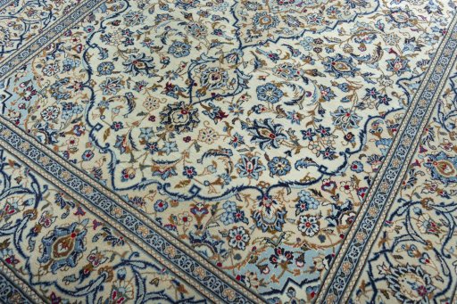 Close-up detail of 2000s Kashan rug from Iran / Persia showing Wool weave