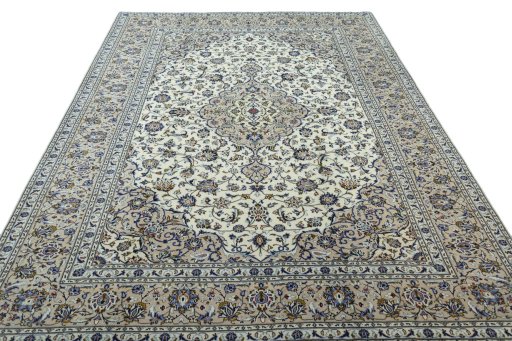 Surface texture of 2000s Kashan rug with natural Wool and intricate pattern