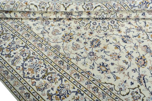 Close-up detail of 2000s Kashan rug from Iran / Persia showing Wool weave
