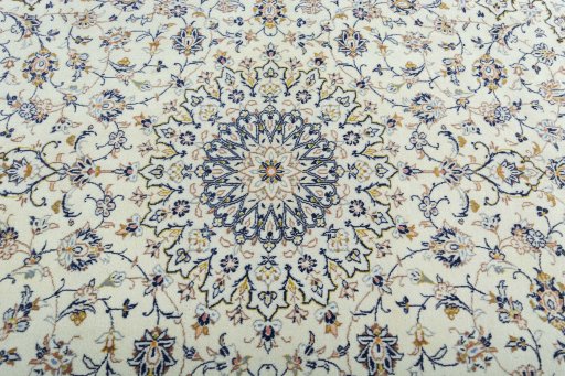 Central medallion detail of 2000s Kashan rug from Iran / Persia