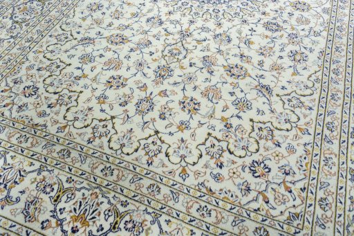 Close-up detail of 2000s Kashan rug from Iran / Persia showing Wool weave
