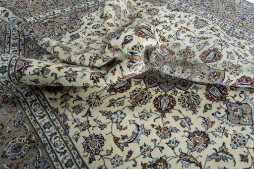 Surface texture of 2000s Kashan rug with natural Wool and intricate pattern