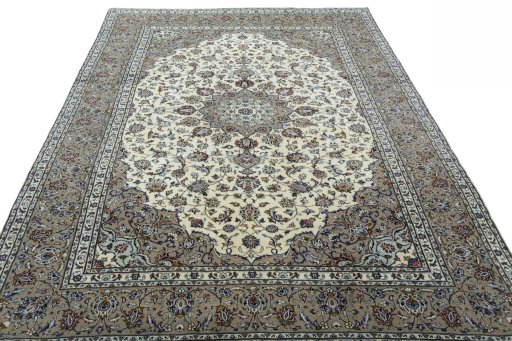 Surface texture of 2000s Kashan rug with natural Wool and intricate pattern