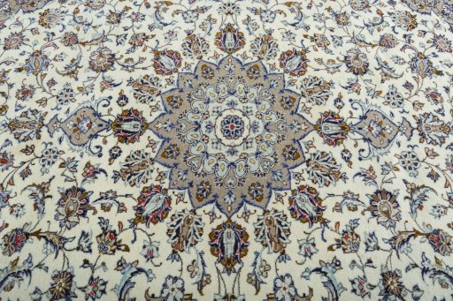 Central medallion detail of 2000s Kashan rug from Iran / Persia