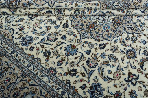 Close-up detail of 2000s Kashan rug from Iran / Persia showing Wool weave