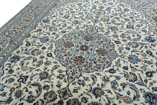 Backside of handmade 2000s Kashan rug showing knot structure and weave density