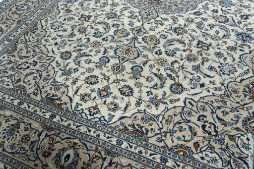 Close-up detail of 2000s Kashan rug from Iran / Persia showing Wool weave