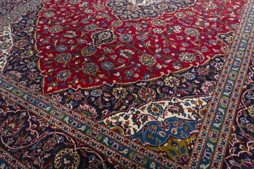 Close-up detail of 2000s Kashan rug from Iran / Persia showing Wool weave
