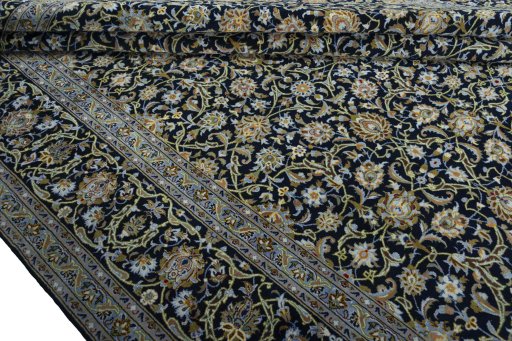 Close-up detail of 2000s Kashan rug from Iran / Persia showing Cork weave