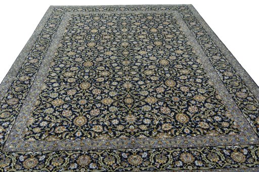 Surface texture of 2000s Kashan rug with natural Cork and intricate pattern