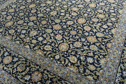 Close-up detail of 2000s Kashan rug from Iran / Persia showing Cork weave