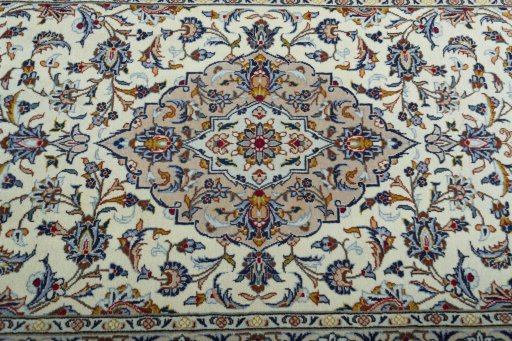 Central medallion detail of 2000s Kashan rug from Iran / Persia