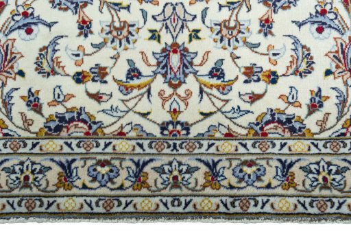 Close-up detail of 2000s Kashan rug from Iran / Persia showing Wool weave