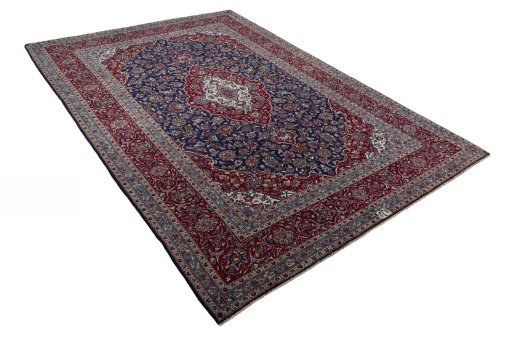 Close-up detail of 2000s Kashan rug from Iran / Persia showing Wool weave