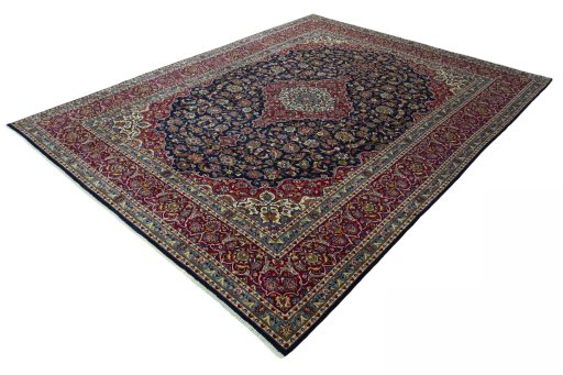 Corner detail of 2000s Kashan rug showing border pattern and Wool pile