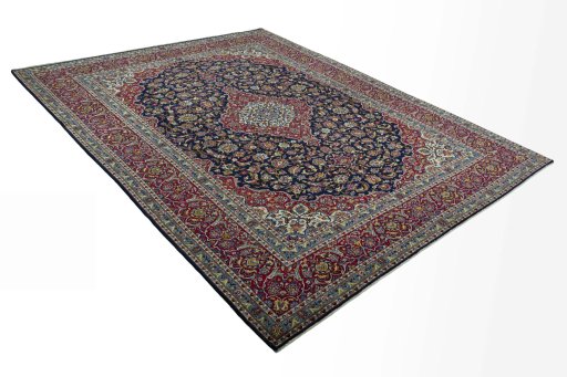 Close-up detail of 2000s Kashan rug from Iran / Persia showing Wool weave