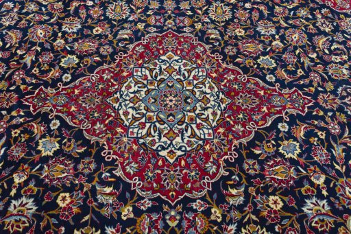 Central medallion detail of 2000s Kashan rug from Iran / Persia