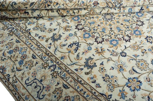 Close-up detail of 2000s Kashan rug from Iran / Persia showing Wool weave
