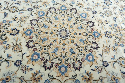 Central medallion detail of 2000s Kashan rug from Iran / Persia