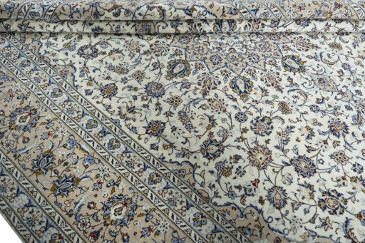 Close-up detail of 2000s Kashan rug from Iran / Persia showing Wool weave