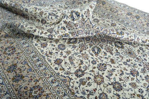 Surface texture of 2000s Kashan rug with natural Wool and intricate pattern