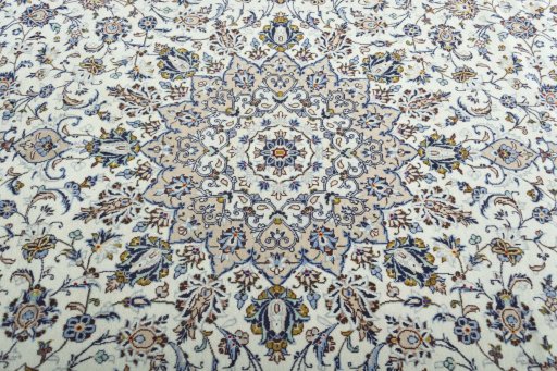 Central medallion detail of 2000s Kashan rug from Iran / Persia