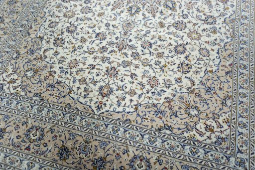 Close-up detail of 2000s Kashan rug from Iran / Persia showing Wool weave