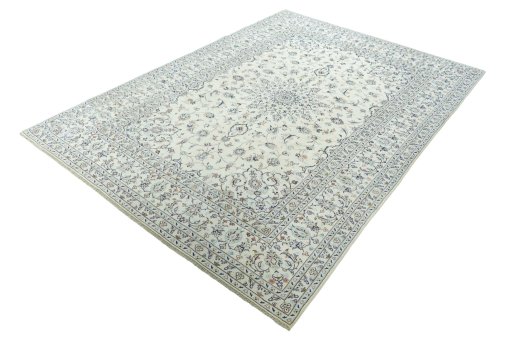 Corner detail of New Kashan rug showing border pattern and Wool pile