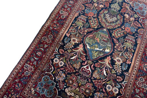 Backside of handmade 1930s Kashan rug showing knot structure and weave density
