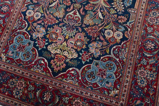 Close-up detail of 1930s Kashan rug from Iran / Persia showing Wool weave
