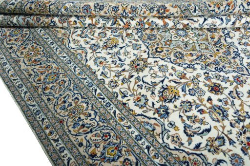 Close-up detail of 2000s Kashan rug from Iran / Persia showing Wool weave