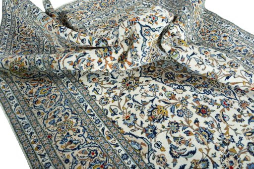 Surface texture of 2000s Kashan rug with natural Wool and intricate pattern