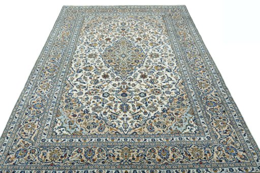 Surface texture of 2000s Kashan rug with natural Wool and intricate pattern